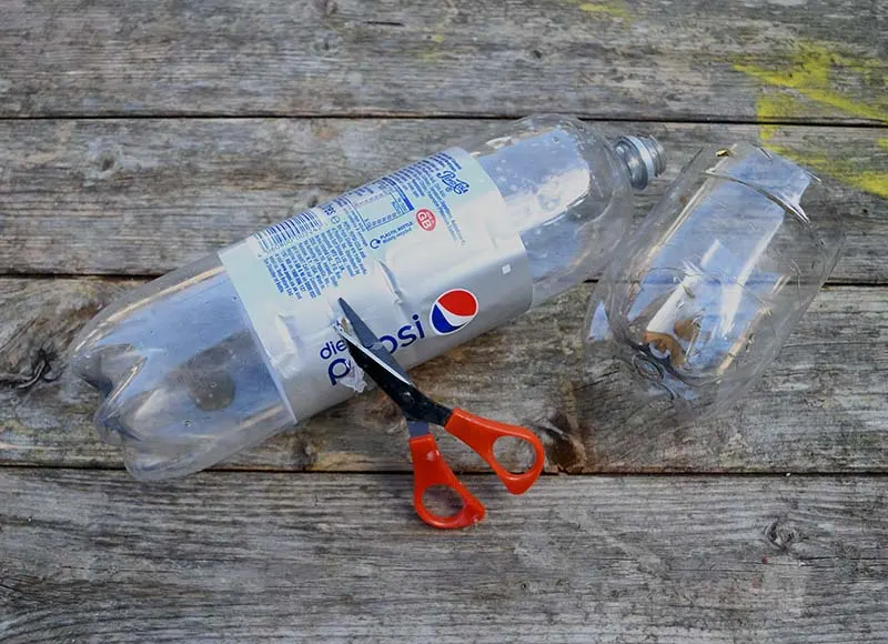 Cutting soda bottles.