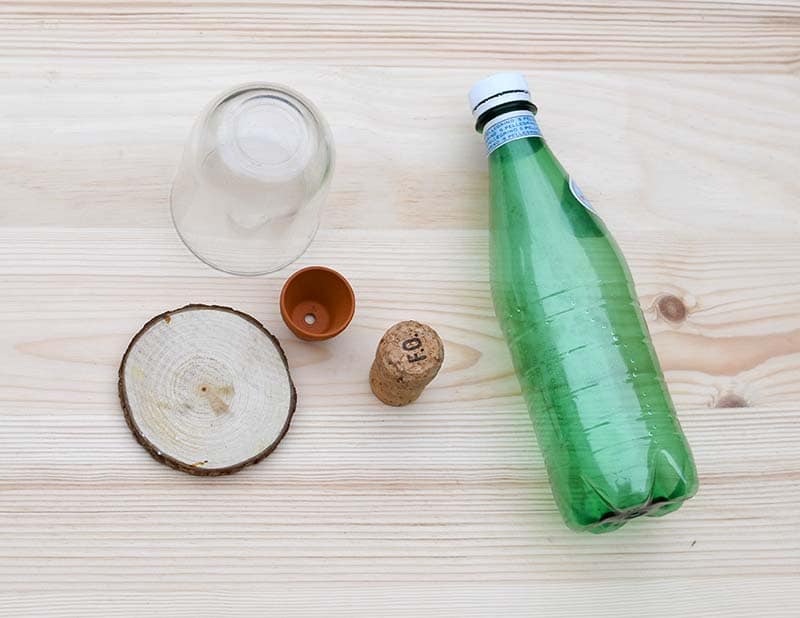 plastic bottle, wood slice and nutella jar