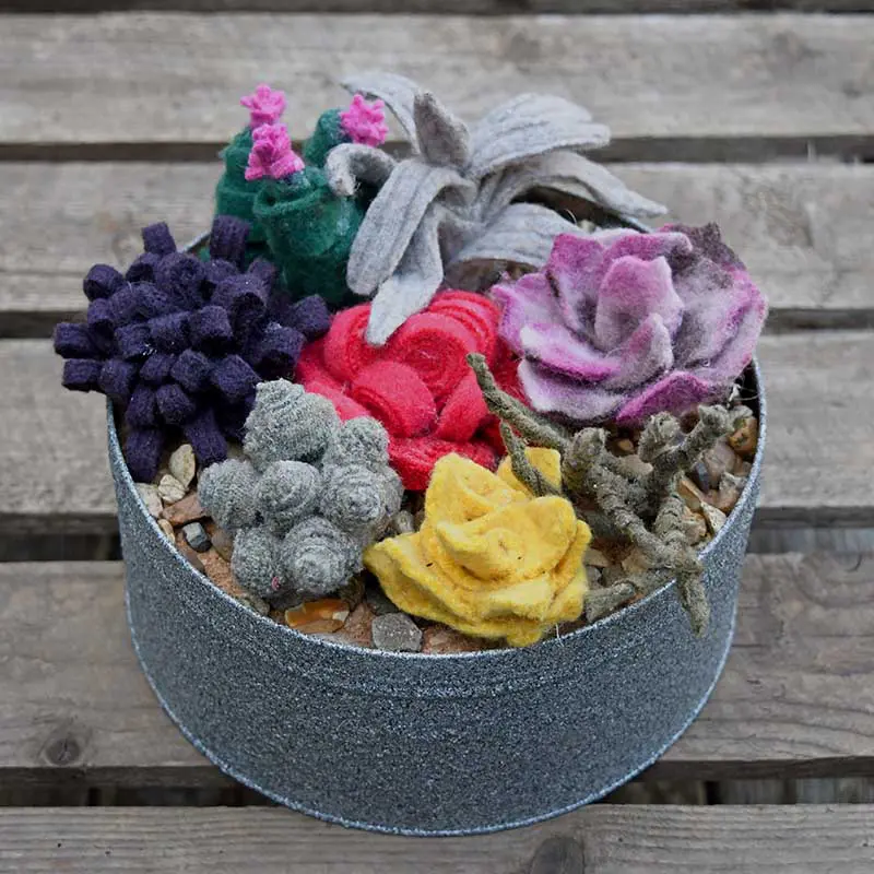Upcycled sweater felt scraps into a faux succulent garden
