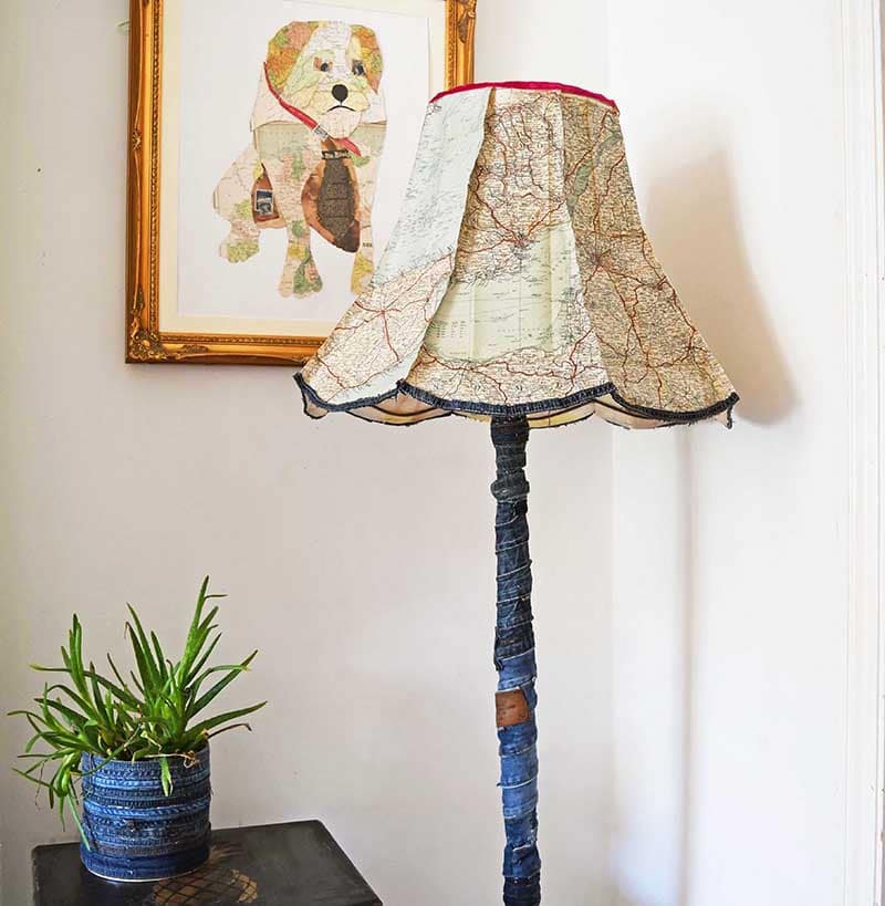 Upcycled floor lamp with roadmaps and denim