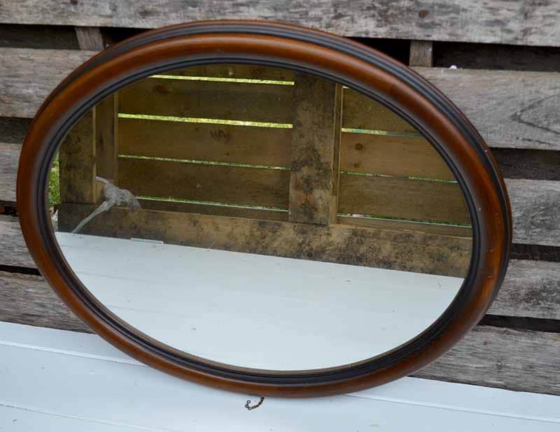 Old oval wall mirror