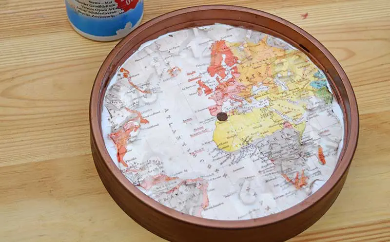 Decoupage map clock with tattoo paper