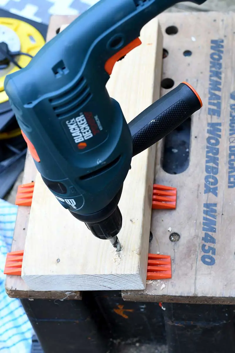 Drilling wood plank for a custom neon sign