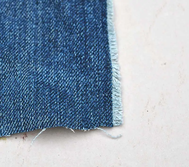 Fraying denim square