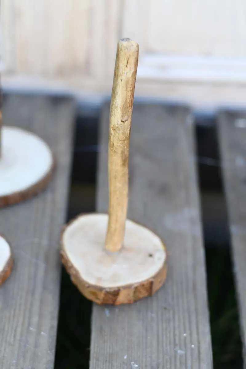 Glueing twig to woodslice