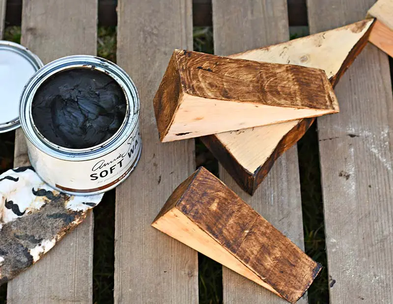 dark wax staining wood triangle scraps