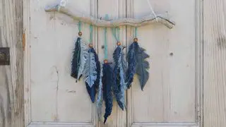 Denim feather wall decor