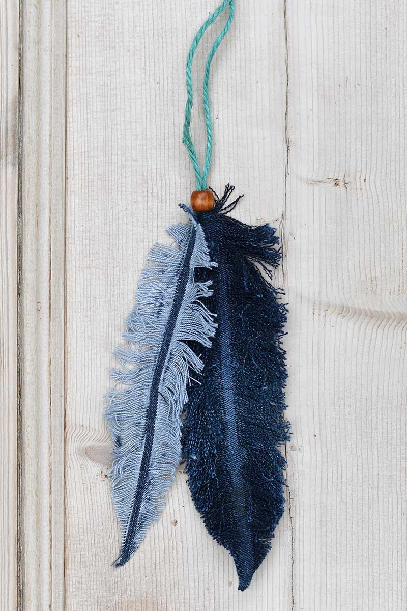 Blue and white repurposed denim feathers