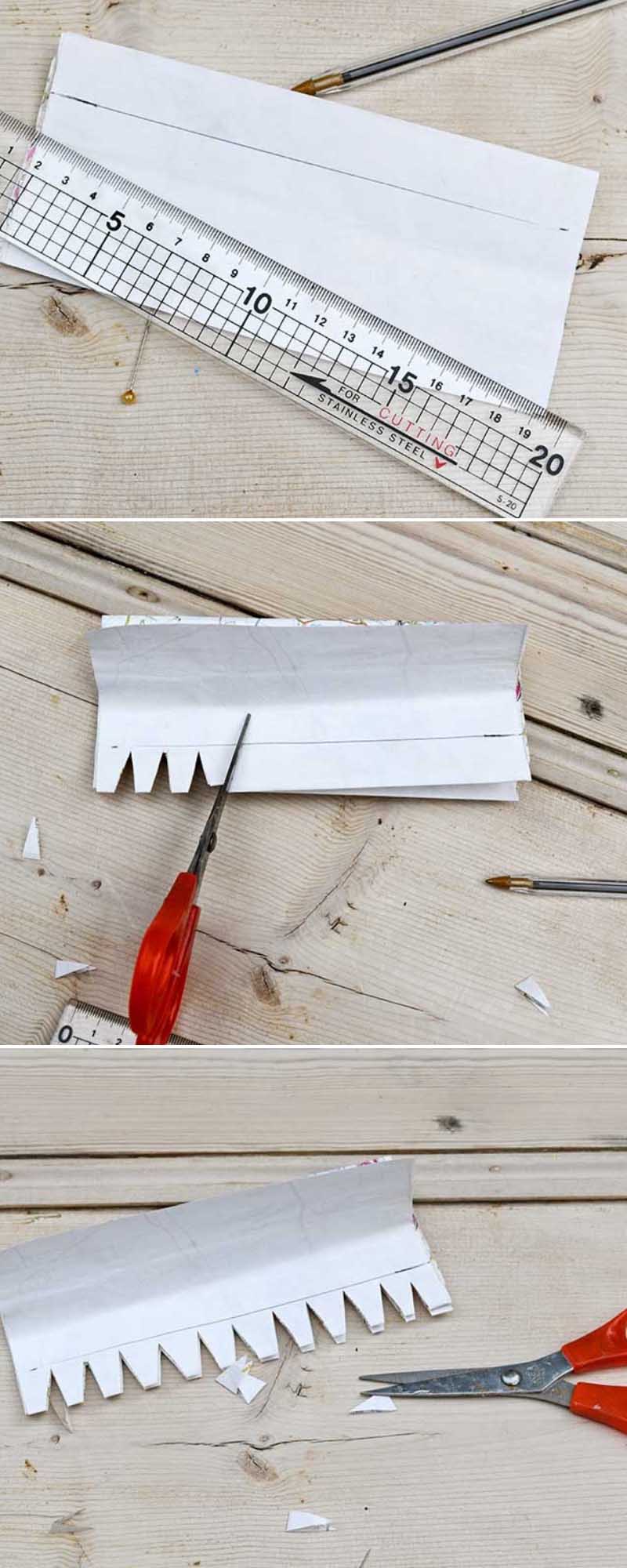 Making handmade Christmas crackers cutting the folds