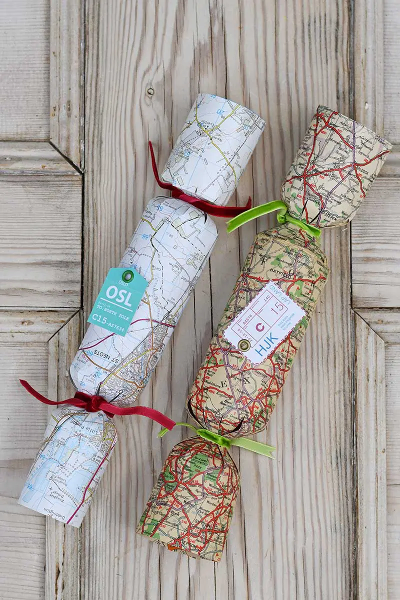 Handmade Christmas crackers from vintage road maps 
