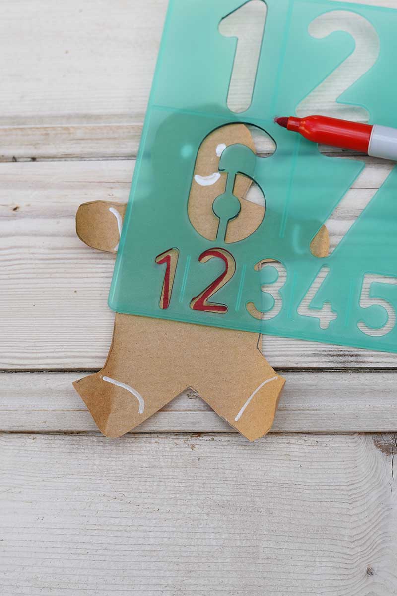 Stenciling advent number on gingerbread