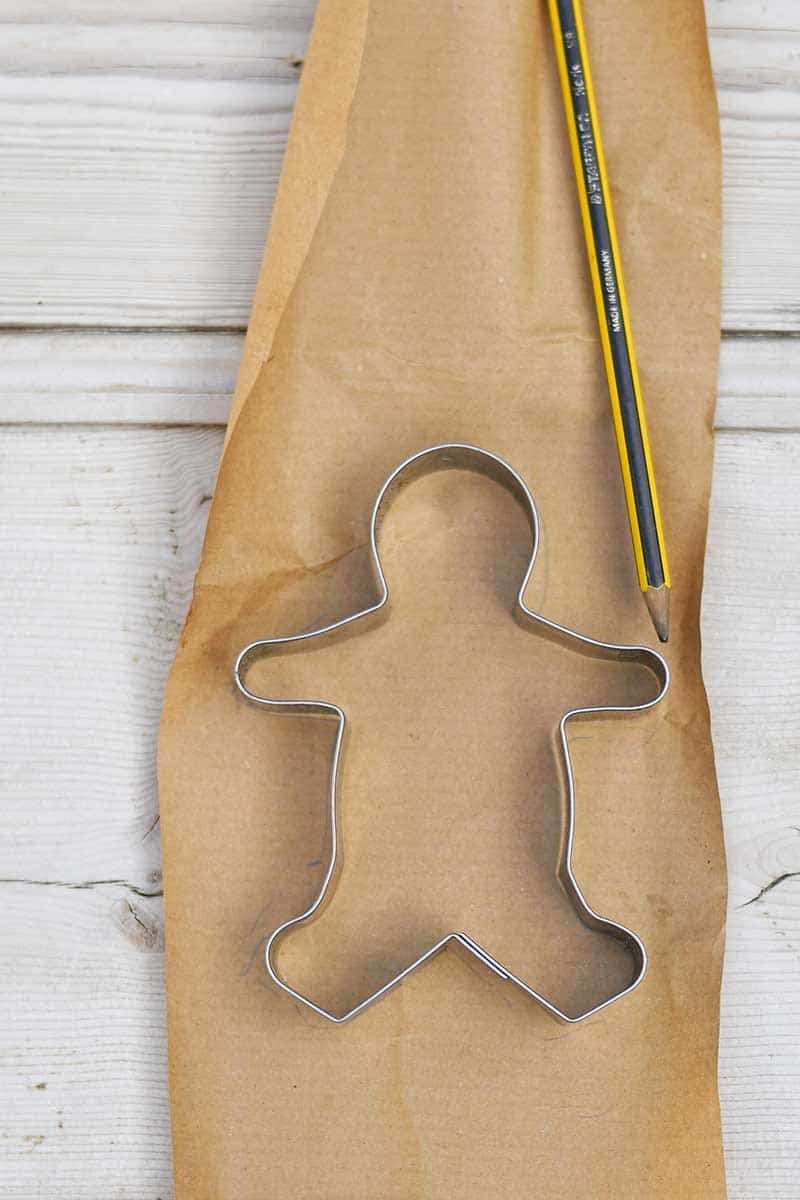 gingerbread cookie cutter and kraft paper