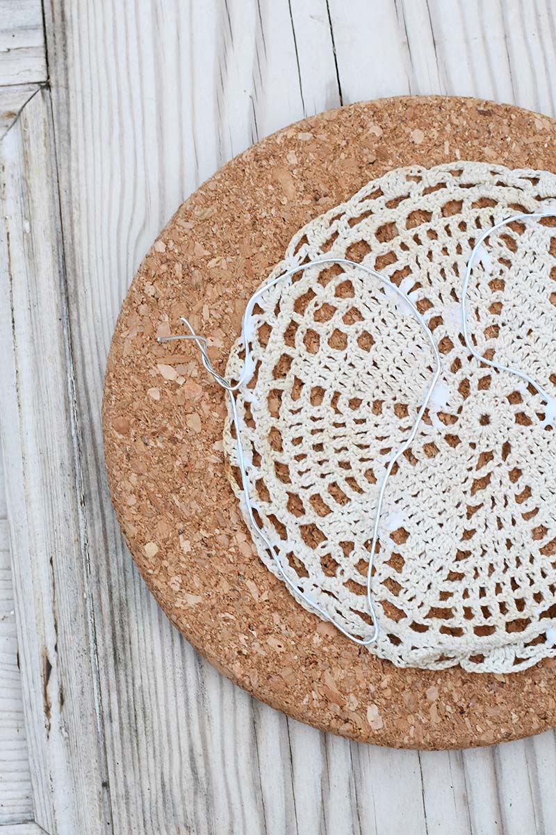 Glueing wire wing frame to doily