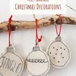 handmade white felt stitched baubles