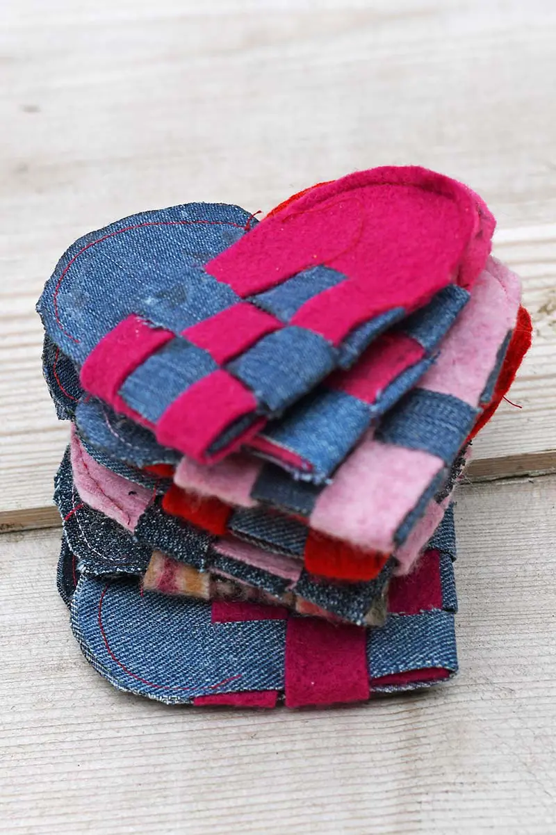 A stack of woven hearts for a Scandinavian garland for Valentine's day.