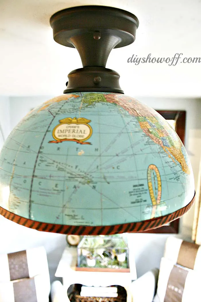 Upcycled lighting with a world globe
