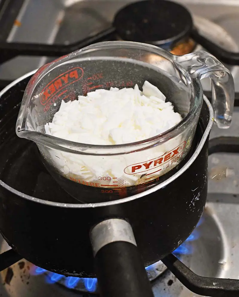 Melting the candle wax in a bain-marie