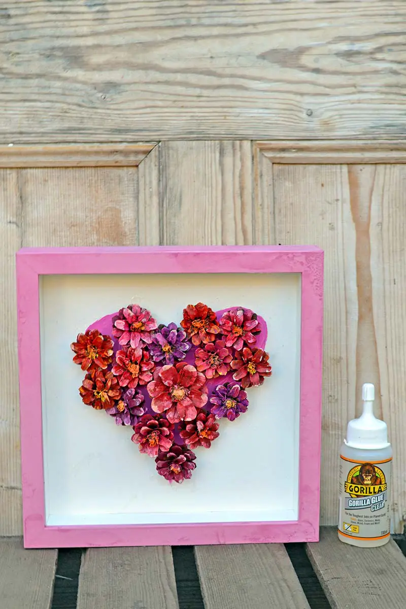 DIY painted pinecone flower heart display made with Gorilla Glue Clear