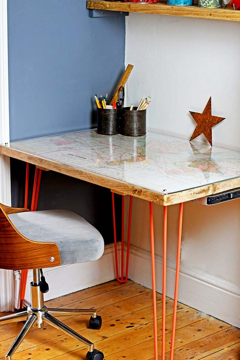 DIY world map desk with living coral hairpin legs