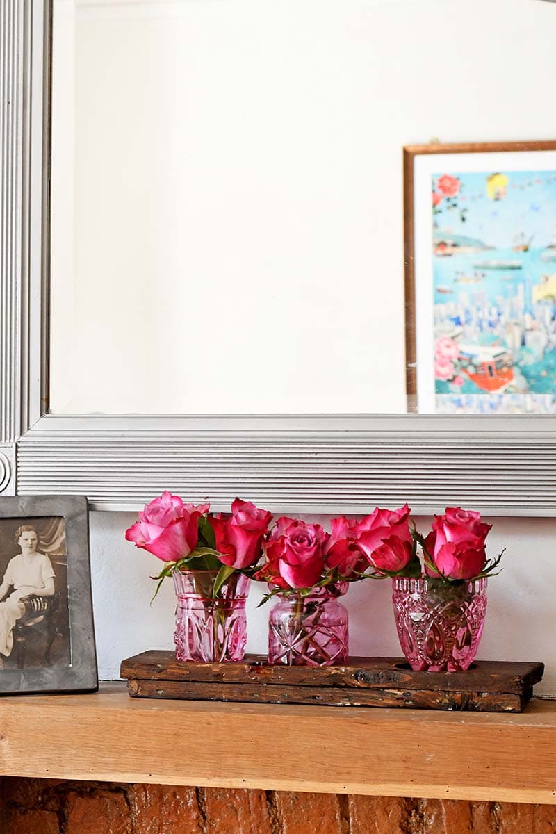 Trio of hand painted pink glass bud vases