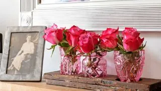 trio of pink glass bud vases