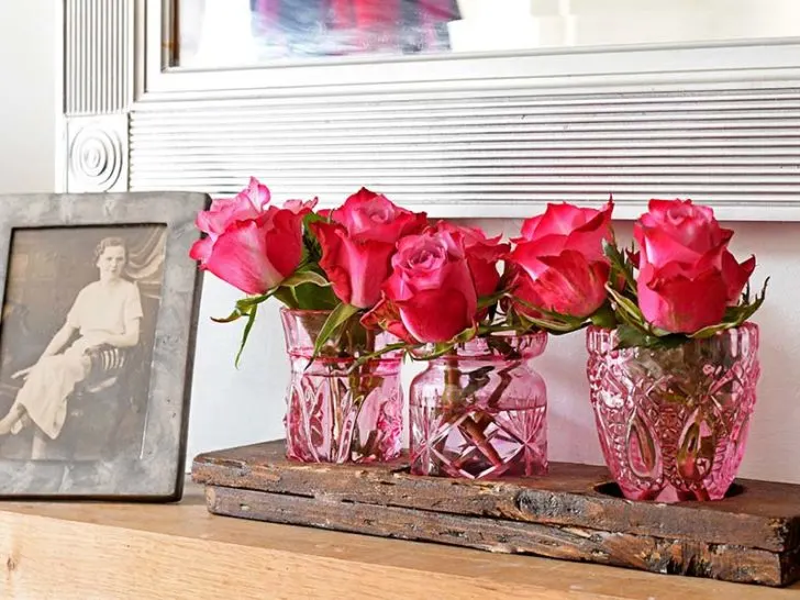 trio of pink glass bud vases