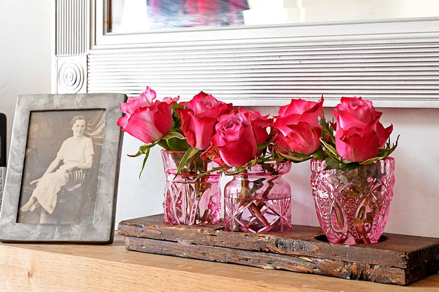 trio of pink glass bud vases