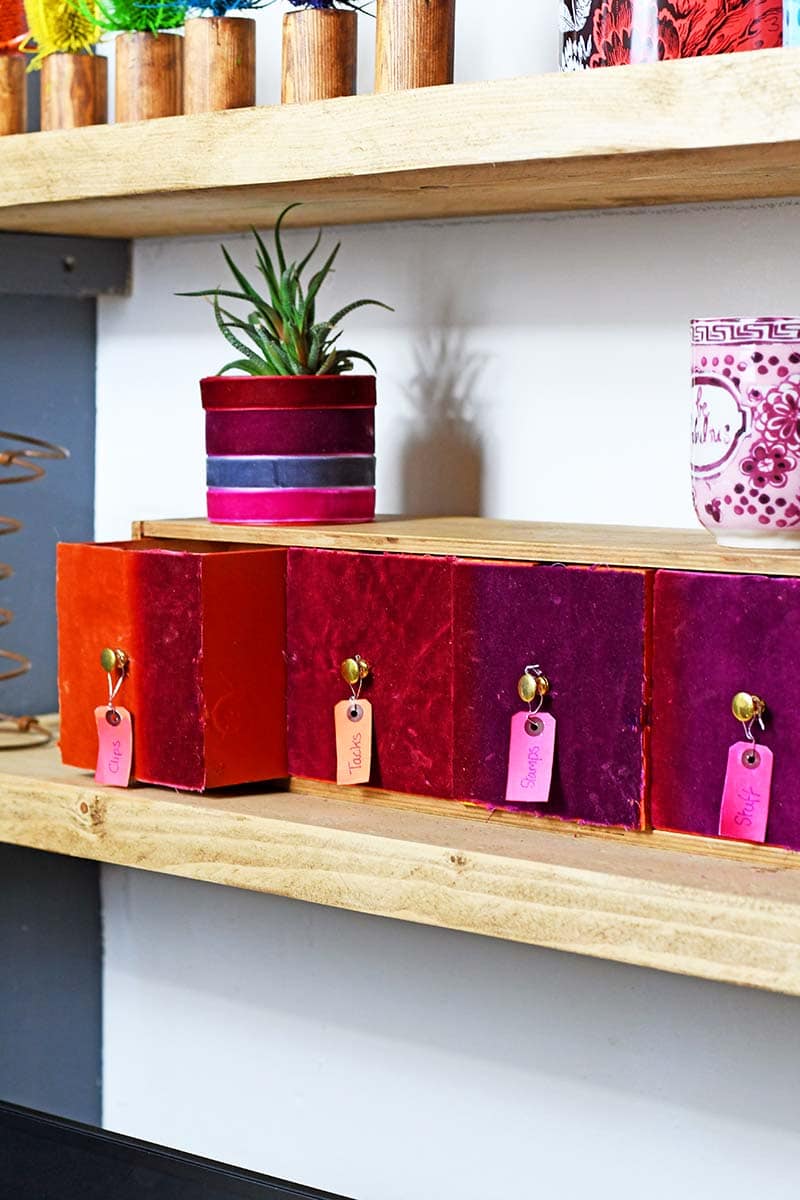 Velvet small wooden drawers on shelf