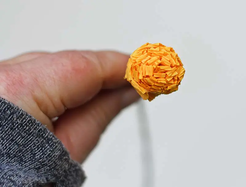 rolled yellow crepe paper