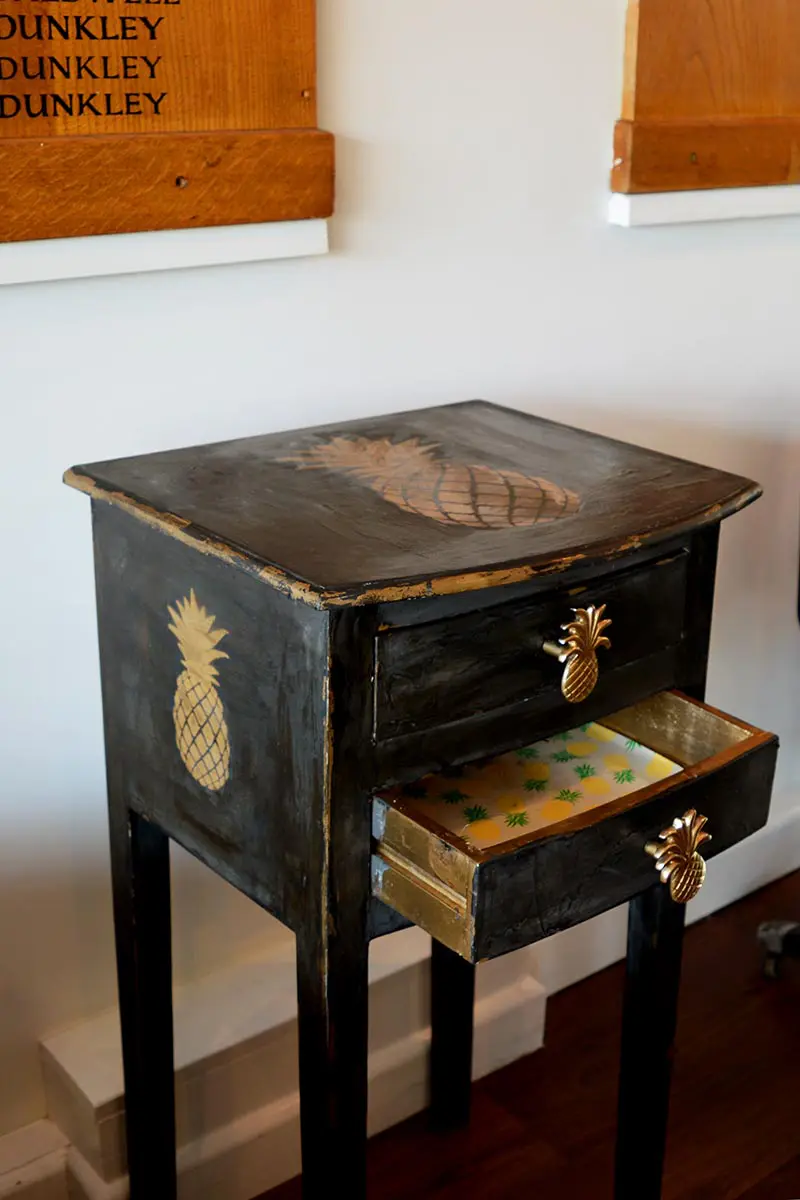 Finished pineapple stenciled console table