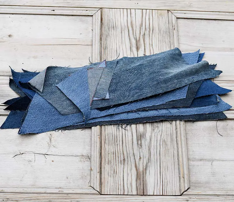 Cut denim chevron pieces for handmade rug