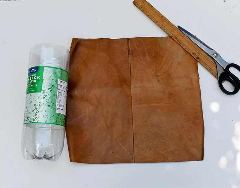 Cutting the leather for the DIY boho vase