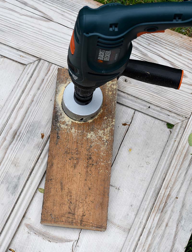 Drilling a saw hole into caddy top