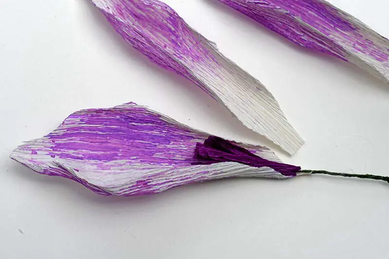 Adding the first petal to the boho crepe paper flower