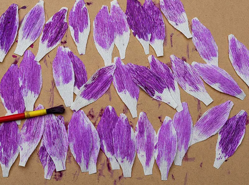 Painted petals drying