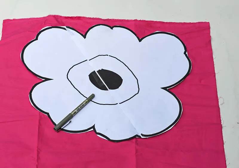 cutting out Unikko poppy pattern