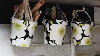 hanging upcycled Marimekko buckets