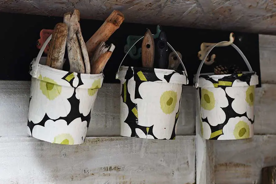 hanging upcycled Marimekko buckets