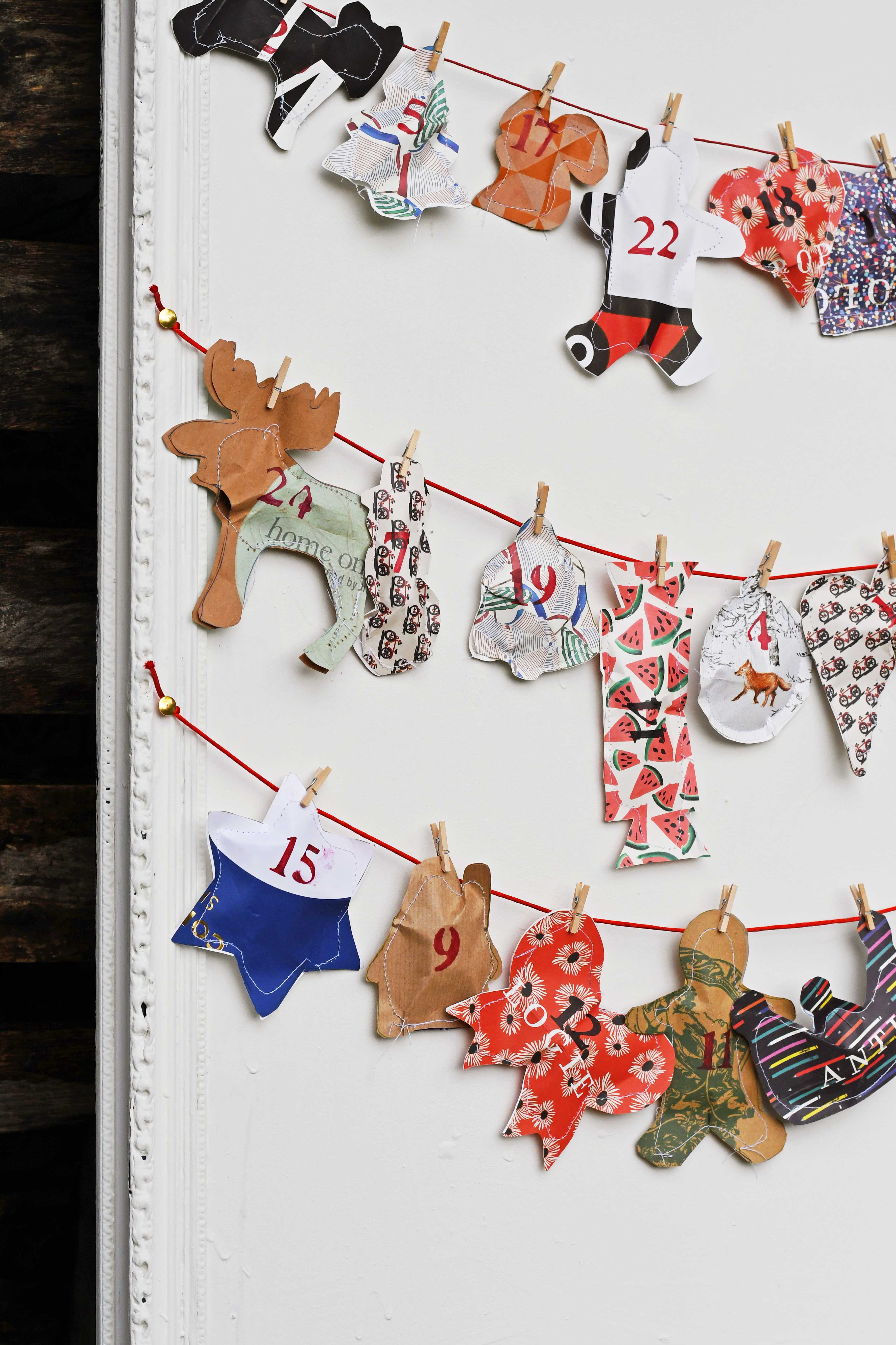 41 Easy Christmas Paper Crafts to Make for the Holidays: Repurposed paper bag advent calendar.
