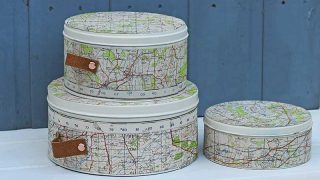 Repurposed map cookie tins