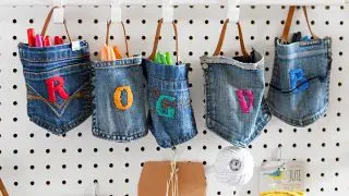 Upcycled hanging pocket storage from old jeans.