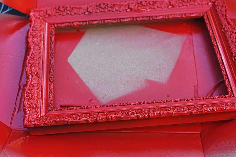 spray painting frame red