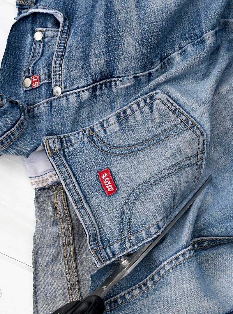 Cutting out a back pocket from jeans