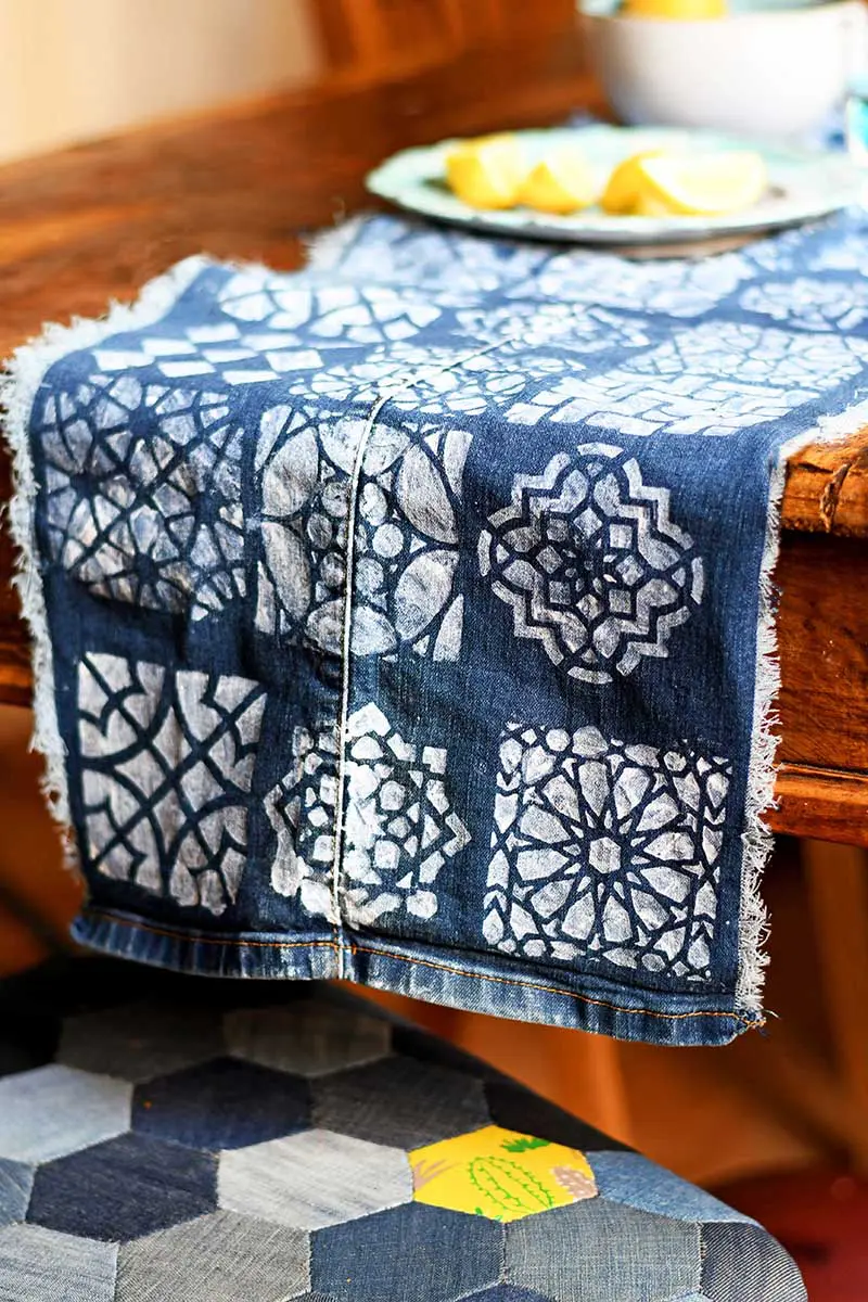 Denim table runner and patchwork chairs