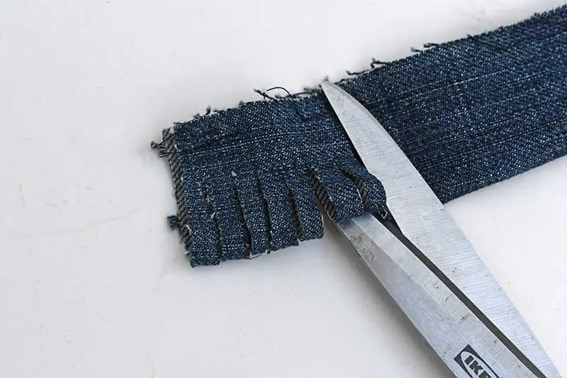 Cutting the folded denim strip