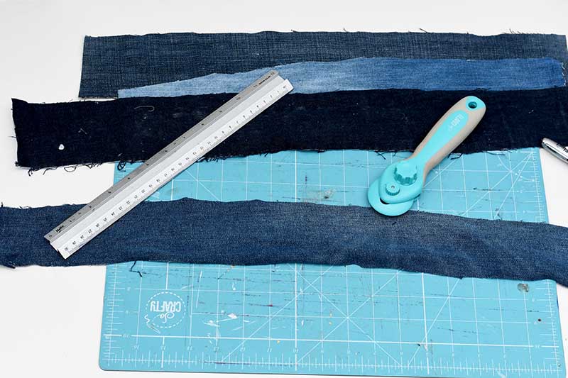 Cutting strips of denim