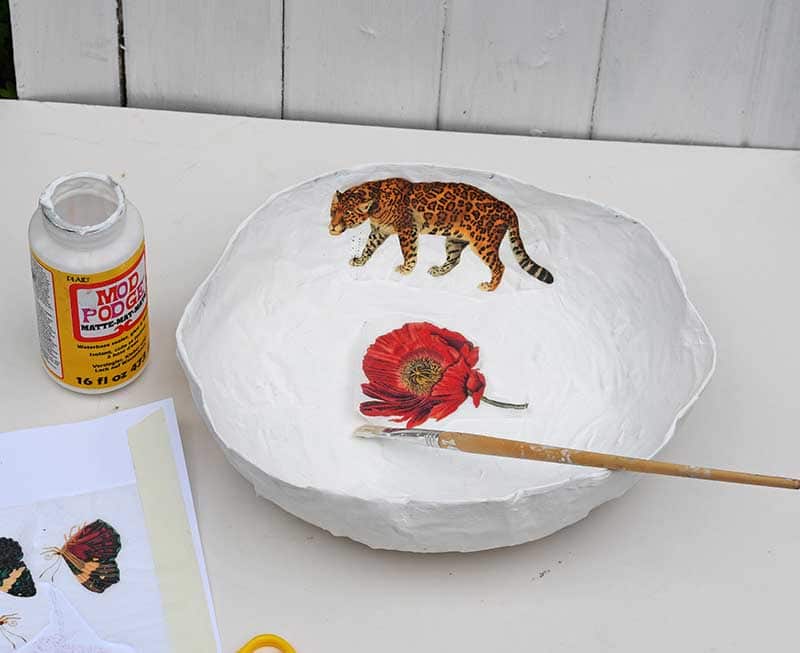 Decoupage a paper mache bowl