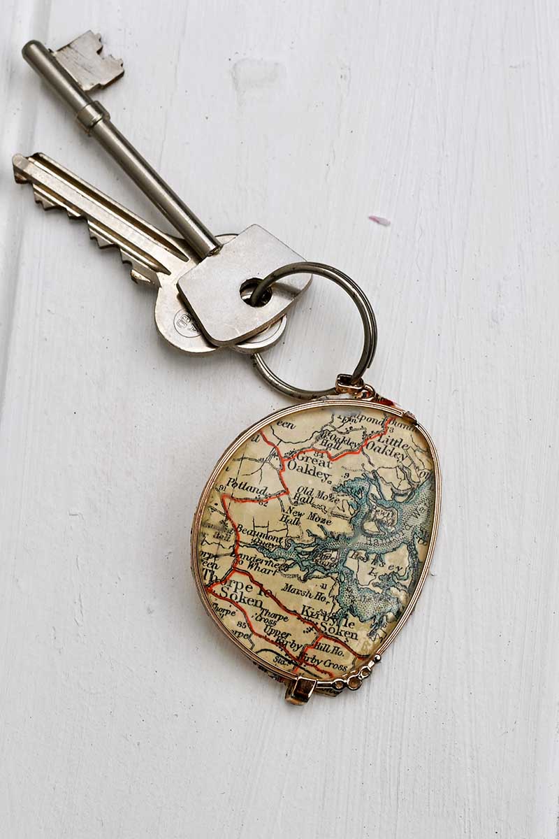 Upcycled road map keychain