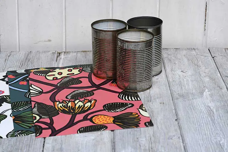 Wallpaper samples and tin cans