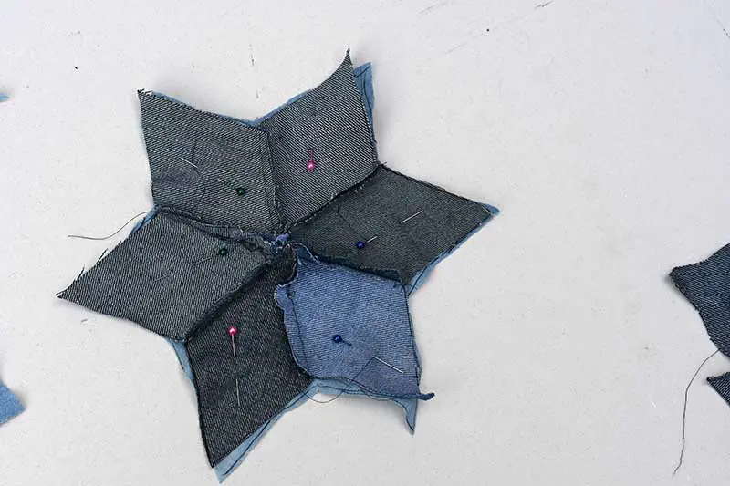 Making denim quilted stars.